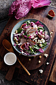 Red Chinese cabbage salad with duck breast, figs and feta