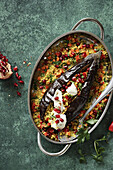 Stuffed aubergine with Moroccan couscous and yoghurt
