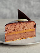 Chocolate cheesecake with caramel layer and chocolate decoration
