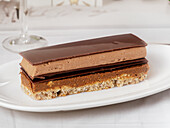 Layer cake with chocolate ganache and nut base