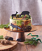 Camouflage cake with fondant animals