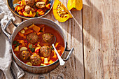 Pumpkin stew with meatballs and vegetables