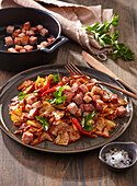 Stir-fried cabbage with bacon and chilli