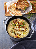 Cauliflower soup with roasted garlic and rosemary