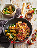 Roast chicken drumsticks with potato gnocchi and spinach
