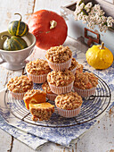 Pumpkin muffins with cream cheese filling and crumbles