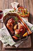 Pheasant in red wine with apples, bacon and rosemary