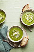 Pea soup with wild herbs and crème fraîche