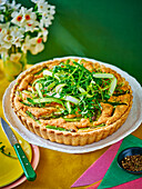 Asparagus tart with rocket, capers and hollandaise
