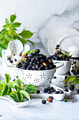 Fresh blackberries in a sieve