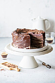 Chocolate honey layered cake Medovik with sour cream