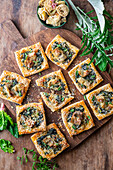 Artichoke puff pastry pockets with spinach and cheese