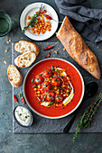 Tomato soup with roasted chickpeas and baguette