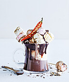 Hot chocolate with ice cream, marshmallows and chilli