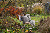 Seat in the autumn garden