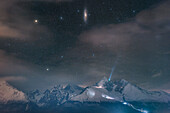 Comet 12P/Pons-Brooks and Andromeda galaxy above High Tatras, composite image