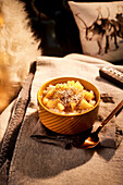 Vegan almond rice pudding with mango and puffed amaranth