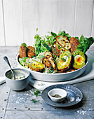 Scotch Caesar salad with poached egg and crusty bread