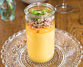 Mango mousse with grated coconut and lime