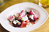 Salad, marinated beetroot, chioggia beets, white goat cheese, samphire