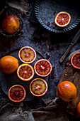 Blood oranges on a dark background