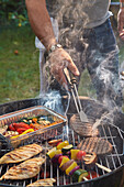 Grilled meat, poultry, skewers and vegetables