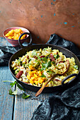 Vegetable and rice pan with mango chutney