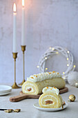 Sponge roll with cream cheese and boiled condensed milk for Christmas