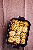 Peanut rolls with peanut cream topping