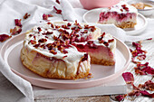 Raspberry cheesecake with rose petals