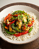 Japanese donburi with chicken and vegetables.