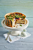 Carrot quiche with broad beans and pesto