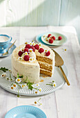 Limoncello naked cake with raspberries