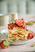 Tiramisu with strawberries, raspberries and pistachios