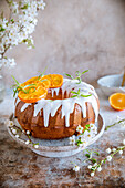 Easter cake with orange flavor in snow white icing