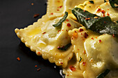 Spinach and ricotta ravioli topped with sage butter.