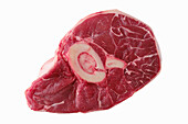 Raw beef ossobuco on a white background