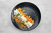 Rice with diced carrots and breadcrumbs