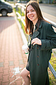 Teenage girl smiling at camera