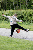 Girl playing football