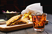 Flatbread with beef filling, chips and cola