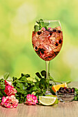 Sangria with dried rosebuds and blackcurrants