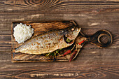 Oven-baked yellowtail mackerel with rice and chilli