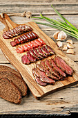 Various sliced air-dried meats and sausages
