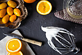 Prepare pavlova with oranges and kumquats