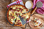 Hawaiian pizza with bacon and pineapple