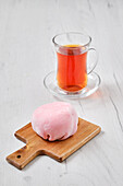 Mochi with strawberry filling and fruit tea