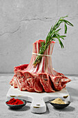 Raw lamb rib crown with rosemary and spices