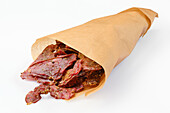 Dried beef jerky in paper bag