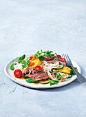 Thai beef salad with mango, tomatoes and glass noodles
